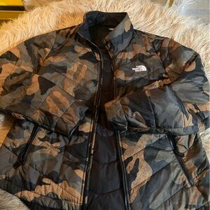 The North Face Camouflage Jacket women’s L 22” pit to pit  Excellent Condition